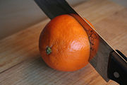 48761-orange-couper-couteau-separation-fonctionnelle-arc.jpg